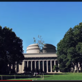 Screen capture of Pi Day video, with drones flying out of MIT dome