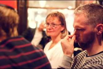 Man holding his nose - photo by Anders Adermark