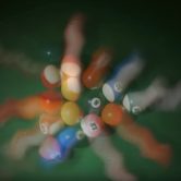 Billiard balls in waves like quantum particles